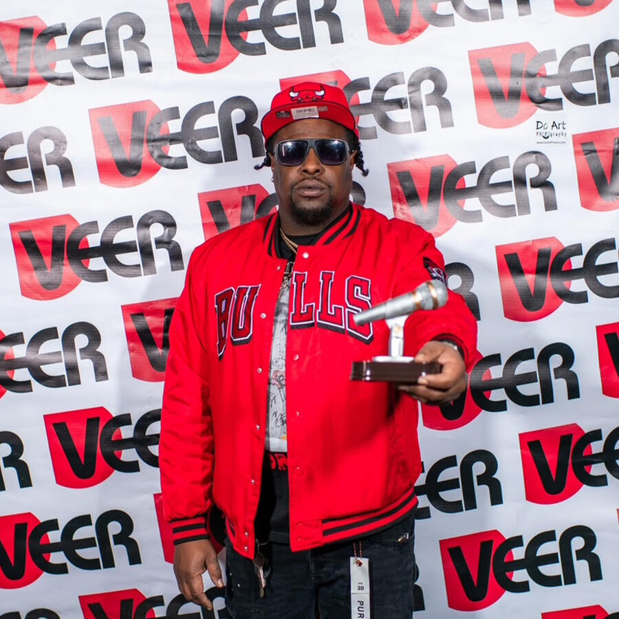 Chuck Black 2026 Veer Hip Hop Artist of The Year Suffolk,Virginia rapper Chuck Black holding veer award
